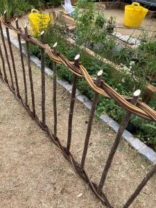 Hazel and Willow fence built around RHS Hampton Court Show Garden 2024